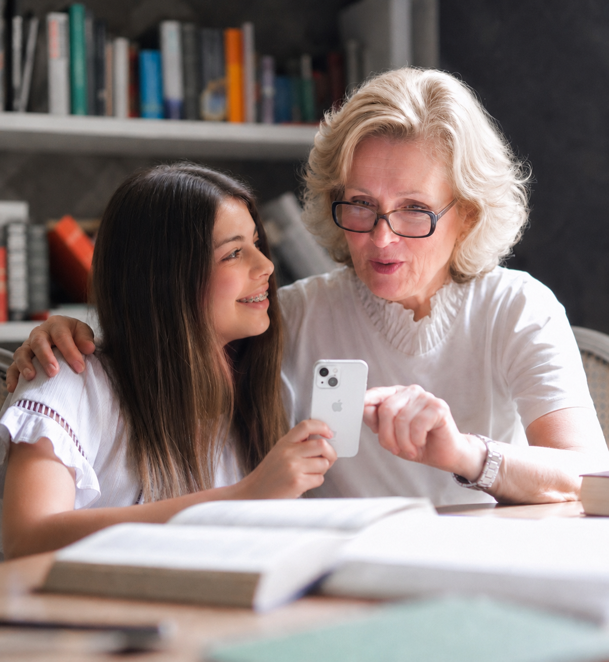 Grandmother and granddaughter preserving family stories together